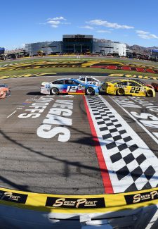 LAS VEGAS, NV - SEPTEMBER 16: Brad Keselowski (2) Team Penske Ford Fusion leads the field past the starting line for the restart of the race for a green/white/checker finish during the Monster Energy NASCAR Cup Series Playoff Race South Point 400 on September 16, 2018, at the Las Vegas Motor Speedway in Las Vegas, NV. (Photo by Chris Williams/Icon Sportswire)