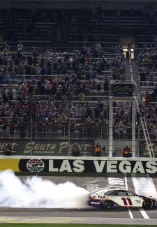 LAS VEGAS, NEVADA - SEPTEMBER 26: Denny Hamlin, driver of the #11 FedEx Office Toyota, celebrates with a burnout after winning the NASCAR Cup Series South Point 400 at Las Vegas Motor Speedway on September 26, 2021 in Las Vegas, Nevada. (Photo by Chris Graythen/Getty Images)